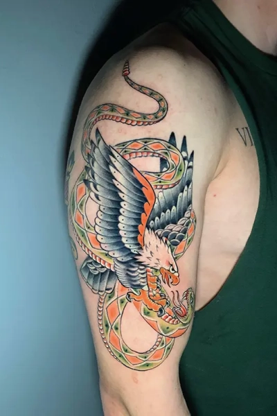 Eagle and snake color tattoo